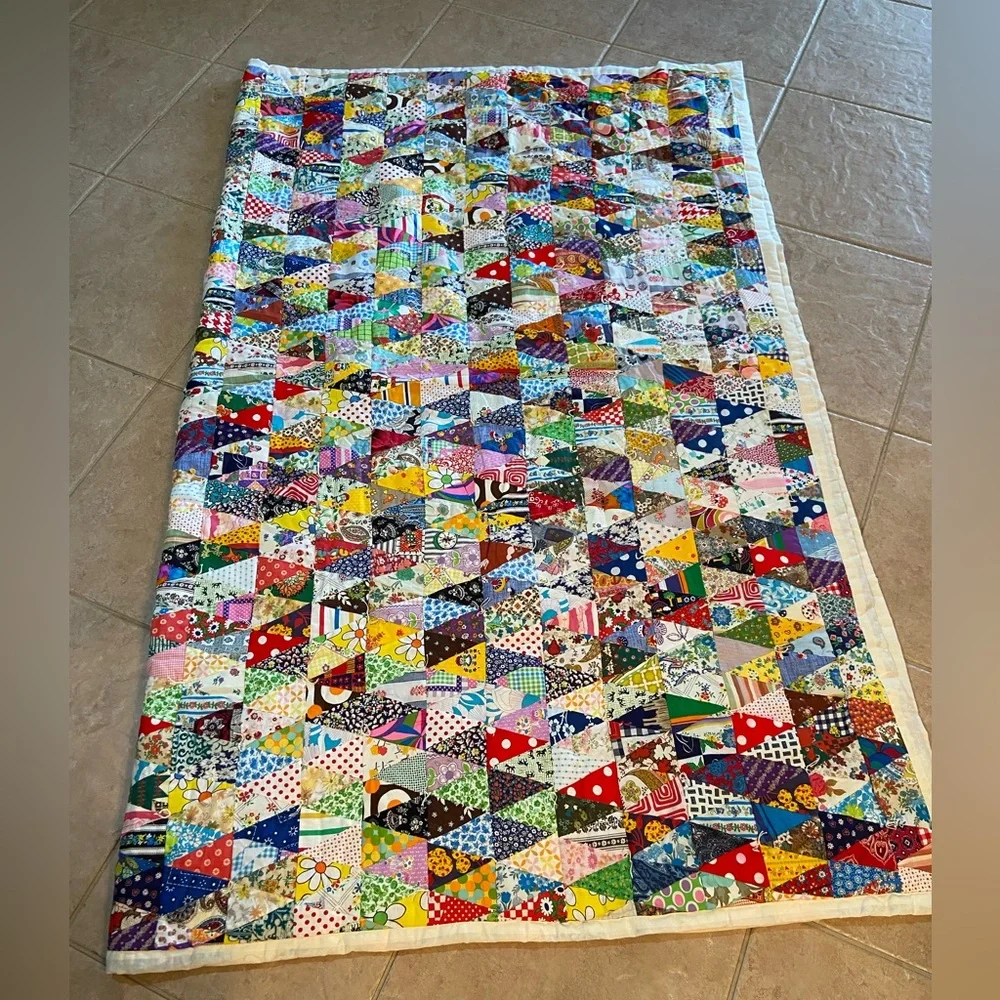 Vintage hand made quilt triangular fabric with solid reverse side
